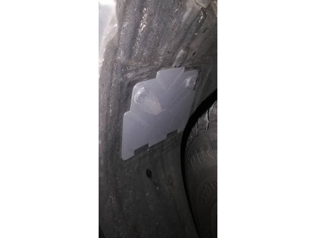 Front-Wheel-Arch Headlight Access Cover — image 1 of 3